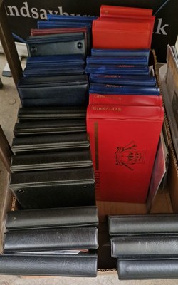 Lot 557 - A box containing thirty first day cover folios...