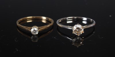 Lot 208K - Two rings comprising a white metal cubic...