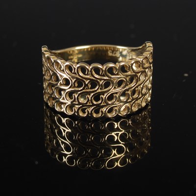 Lot 208O - A 9ct gold four row open work ring, size 'P',...