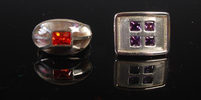Lot 208R - Two silver rings to include one set with...