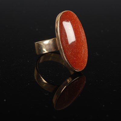 Lot 208W - A 9ct gold and gold stone cabochon ring, size '...
