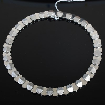 Lot 210R - A heavy white gold necklace, stamped '750',...