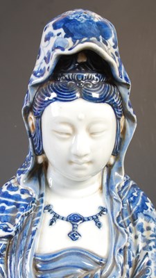 Lot 522 - A Chinese blue and white porcelain figure of...