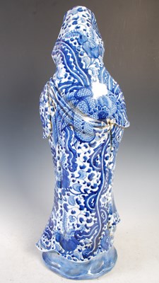 Lot 522 - A Chinese blue and white porcelain figure of...
