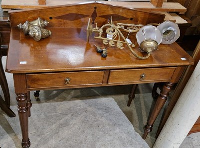 Lot 869 - A 19th century mahogany side table with shaped...