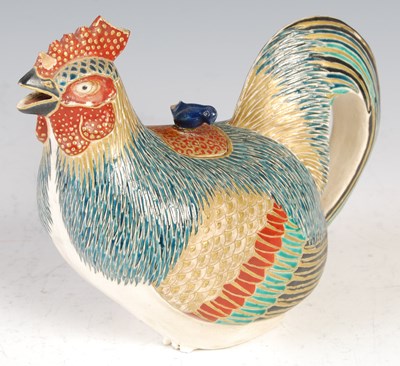 Lot 576 - A Japanese Satsuma pottery teapot and cover in...