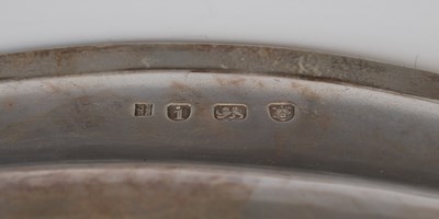 Lot 380 - A George III silver platter, London, 1784,...