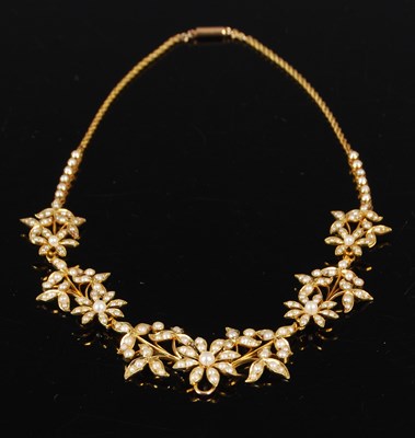 Lot 435 - A late 19th century yellow metal and split...