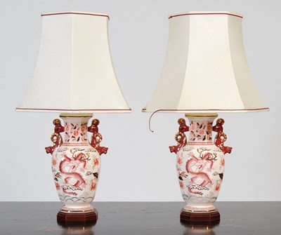 Lot 165 - A pair of English pottery table lamps and...