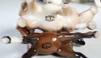 Lot 1 - A collection of eleven assorted Beswick animal...