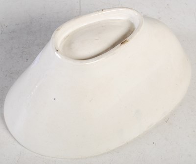 Lot 17 - A 19th century pottery jelly mould forming a...