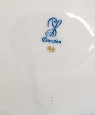 Lot 24 - A group of four Dresden porcelain double...