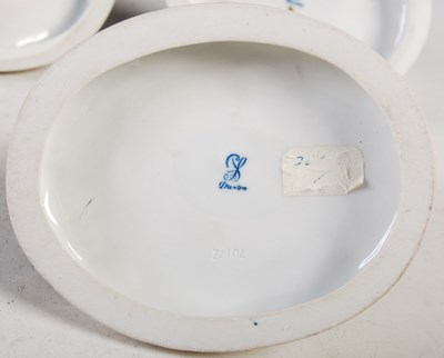 Lot 24 - A group of four Dresden porcelain double...