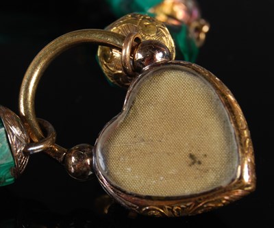 Lot 38 - A yellow metal mounted malachite bracelet with...