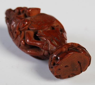 Lot 60 - An antique Chinese carved and pierced coquilla...