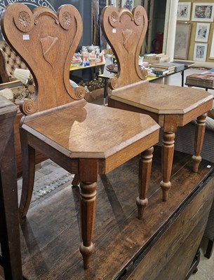 Lot 862 - A pair of 19th century oak hall chairs, the...