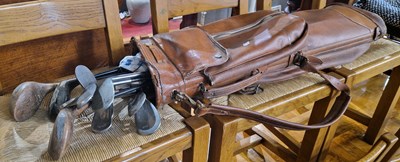 Lot 886 - A vintage brown leatherette golf bag...