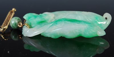 Lot 37 - A Chinese yellow and white metal mounted jade...