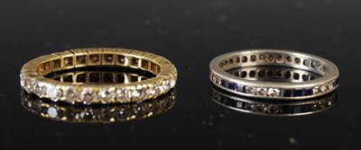 Lot 43 - Two eternity rings to include a yellow metal...