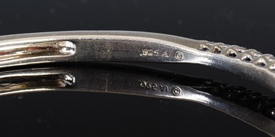 Lot 43 - A white metal and synthetic sapphire single...