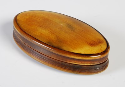 Lot 380 - An early 19th century horn oval snuff box,...