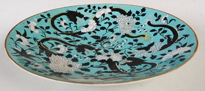 Lot 337 - A Chinese porcelain turquoise blue ground dish,...