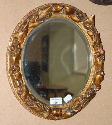 Lot 611 - A mid 20th century gilt framed oval bevelled...