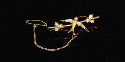 Lot 689A - A yellow metal and split pearl swallow brooch,...