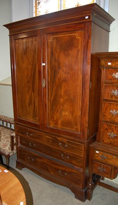 Lot 631 - An Edwardian mahogany linen press, the upper...