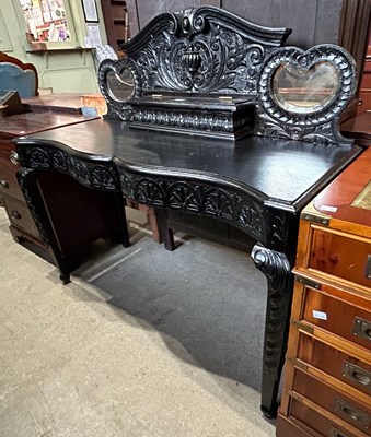 Lot 589 - A late 19th/early 20th century stained oak...