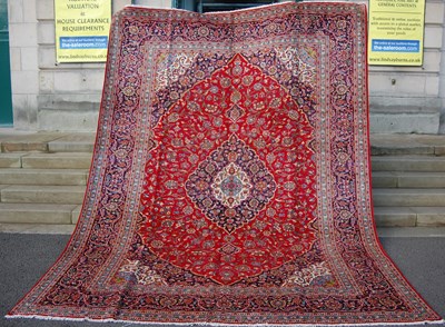 Lot 857 - A Persian Kashan carpet, 20th century, the...
