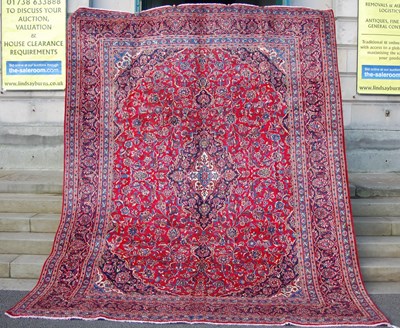 Lot 161 - A Persian Mashad carpet, 20th century, the...