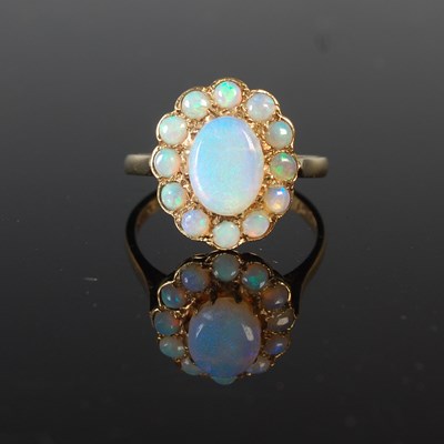 Lot 41 - A 9ct gold and opal cluster ring, size Q,...