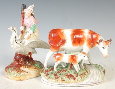 Lot 403 - Two Staffordshire figure groups, one modelled...