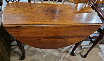 Lot 721 - A George III mahogany drop-leaf dining table,...