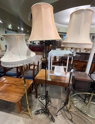 Lot 713 - Three assorted standard lamps and shades.