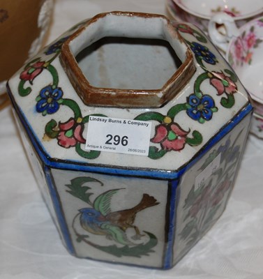 Lot 296 - A Persian pottery hexagonal shaped jar...