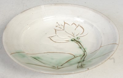 Lot 35 - A Studio Pottery slip-glazed plate with...