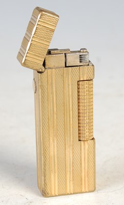 Lot 92 - A vintage gold plated Dunhill gas lighter,...