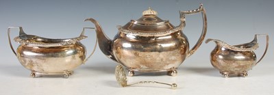 Lot 121 - An antique three piece London silver tea set,...