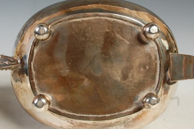 Lot 121 - An antique three piece London silver tea set,...