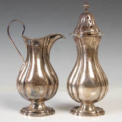 Lot 126 - A Birmingham silver cream jug and sugar castor...