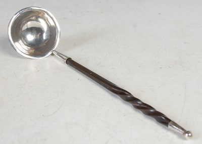 Lot 142 - An antique silver toddy ladle, with baleen...