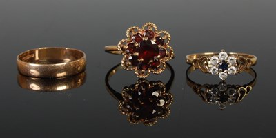 Lot 208 - A group of three 9ct gold rings to include a...