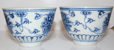 Lot 249 - Two Chinese blue and white porcelain tea bowls,...