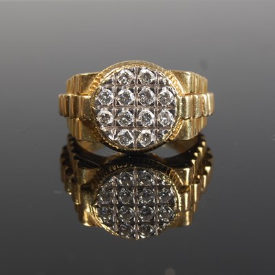 Lot 295 - An 18ct gold and diamond set ring, formed in...