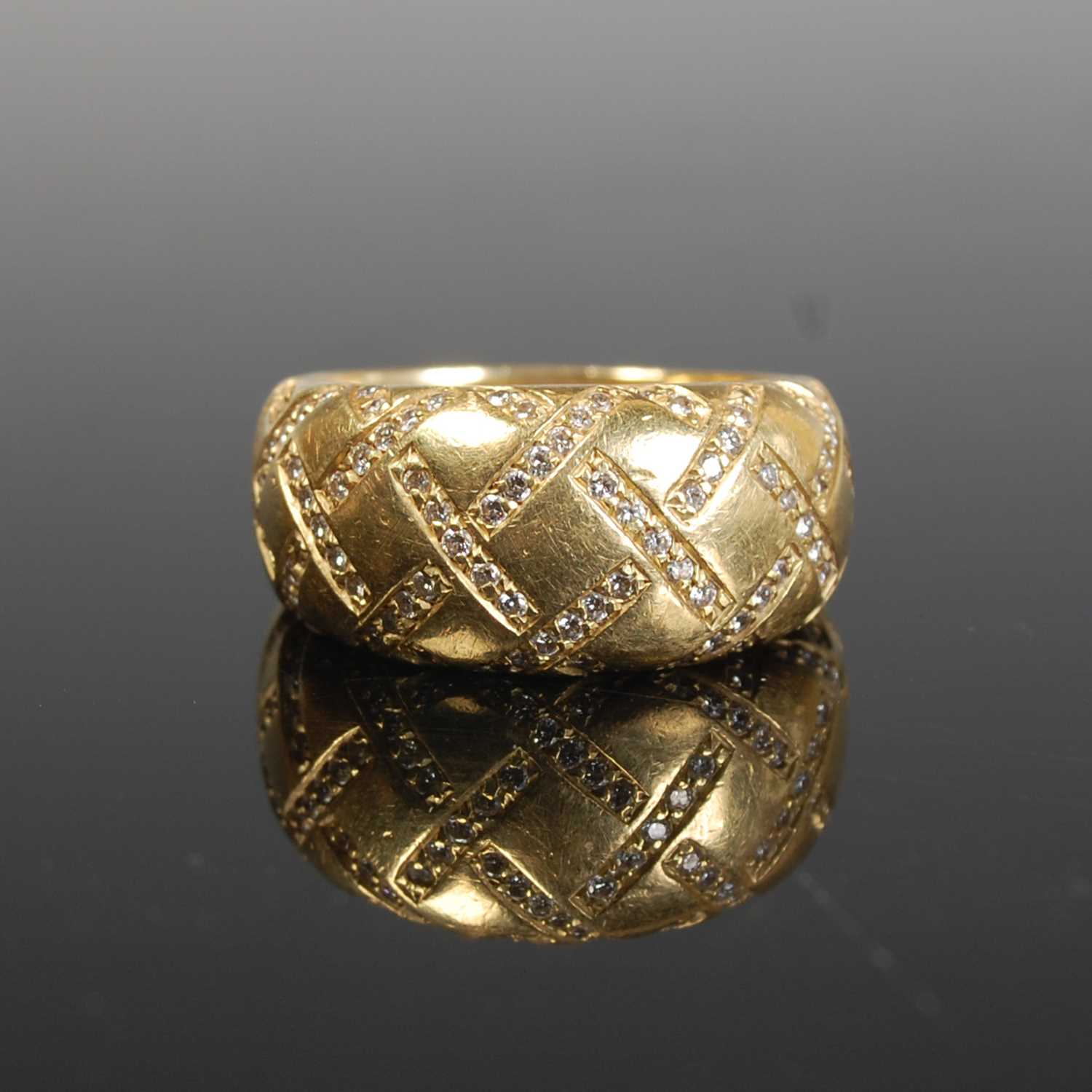 Lot 298 - An 18ct gold and diamond dress ring by Boodles,...