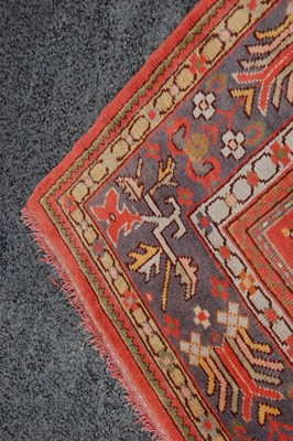 Lot 803 - A late 19th/ early 20th century madder ground...