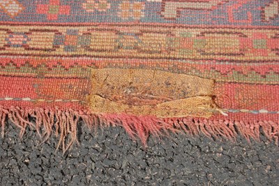 Lot 803 - A late 19th/ early 20th century madder ground...