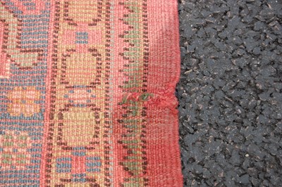 Lot 803 - A late 19th/ early 20th century madder ground...
